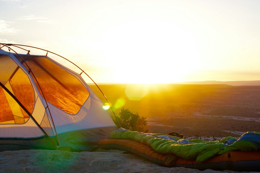 A mountain campsite overlooking the sea
