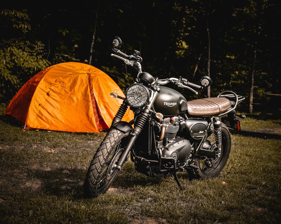 A vehicle-friendly beach campsite at sunset